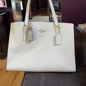Cream color Large Coach Tote. With gold hardware.